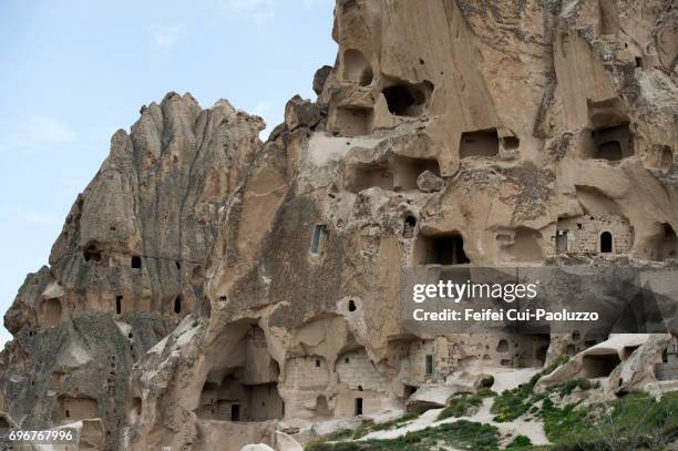 underground living caves and fairy chimneys rock at uçhisar, nevşehir province, central anatolia region, turkey - nevşehir province 個照片及圖片檔