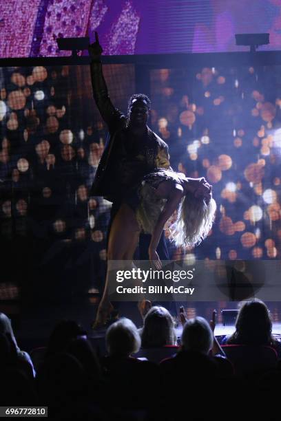 Rashad Jennings and Emma Slater perform at the Dancing With The Stars Hot Summer Nights Tour at Caesars Atlantic City on June 17, 2017 in Atlantic...