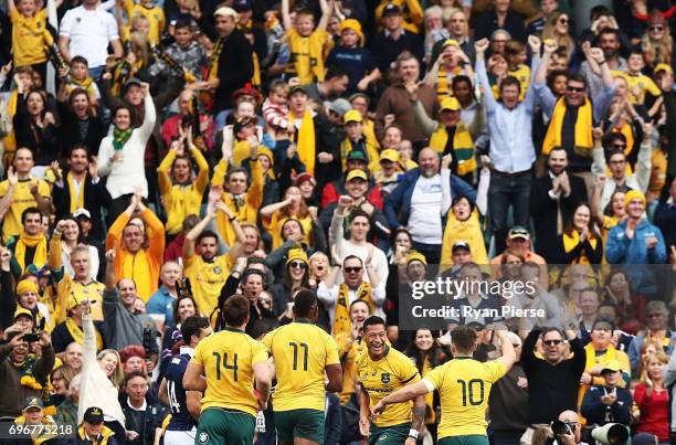 Israel Folau of the Wallabies celebrates after scoring a try during the International Test match between the Australian Wallabies and Scotland at...