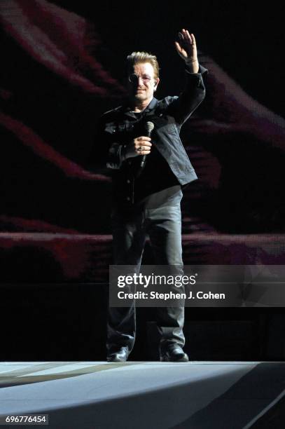 Bono of U2 performs on stage at Papa John's Cardinal Stadium on June 16, 2017 in Louisville, Kentucky.