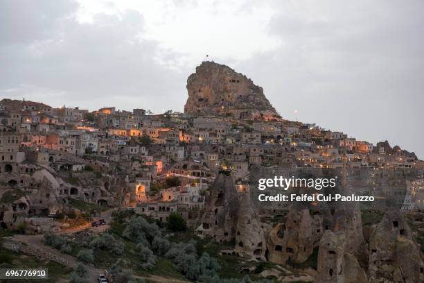 underground living caves and fairy chimneys rock at uçhisar, nevşehir province, central anatolia region, turkey - nevşehir province 個照片及圖片檔