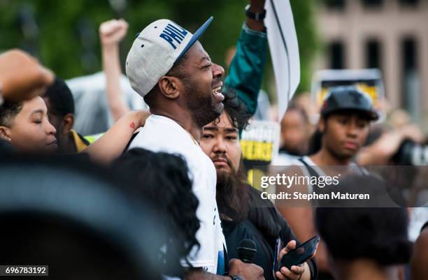 John Thompson, a friend and former colleague of Philando Castile, breaks down after speaking on the steps of the Minnesota State Capitol building on...