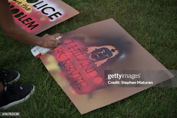 Signs depicting Philando Castile are spray painted on June 16, 2017 in St Paul, Minnesota. Protests erupted in Minnesota after Officer Jeronimo Yanez...