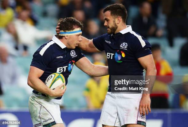 Hamish Watson of Scotland celebrates with Alex Dunbar of Scotland after scoring a try during the International Test match between the Australian...