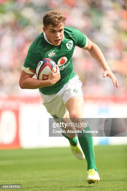 Garry Ringrose of Ireland runs with the ball during the international rugby friendly match between Japan and Ireland at Shizuoka Stadium on June 17,...