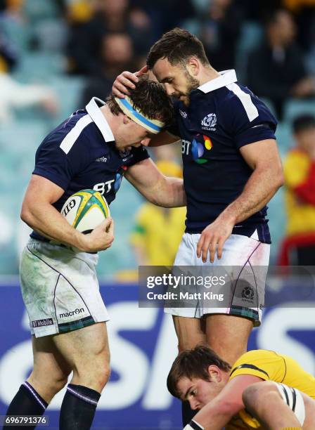 Hamish Watson of Scotland celebrates with Alex Dunbar of Scotland after scoring a try during the International Test match between the Australian...