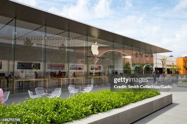 Glass facade of the Apple store at the Stanford Shopping Center, an upscale outdoor shopping mall in the Silicon Valley town of Stanford, California,...