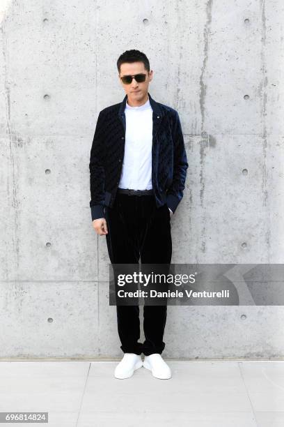 Hu Ge attends the Emporio Armani show during Milan Men's Fashion Week Spring/Summer 2018 on June 17, 2017 in Milan, Italy.