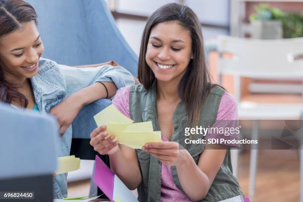 college students use notecards to study for exam - flash card stock pictures, royalty-free photos & images