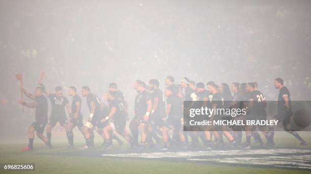 The Maori All Blacks' team performs the haka before the international rugby match between New Zealand's Maori All Blacks and the British and Irish...