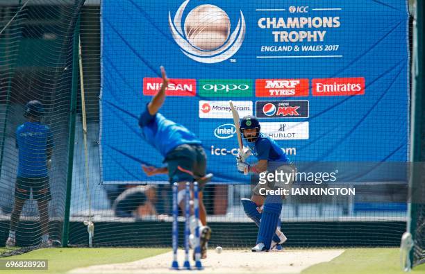 India's captain Virat Kohli attends a nets practice session at The Oval in London on June 17 on the eve of the ICC Champions Trophy Final cricket...