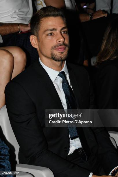 Caua Reymond attends the Emporio Armani show during Milan Men's Fashion Week Spring/Summer 2018 on June 17, 2017 in Milan, Italy.