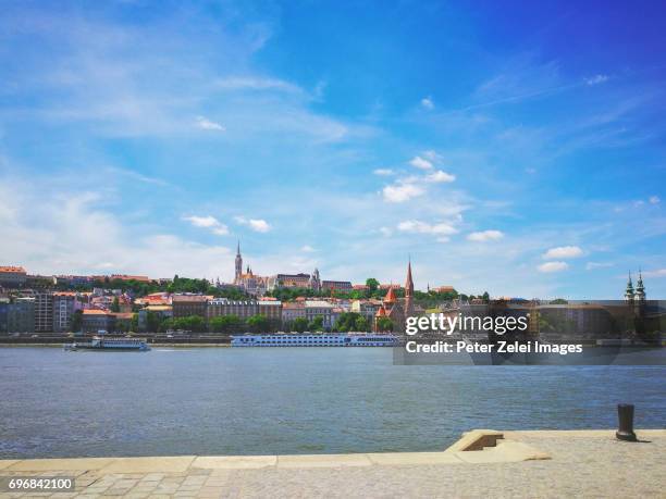 budapest cityscape with the matthias church and the fishermen's bastion in the background - fishermen's bastion stock pictures, royalty-free photos & images