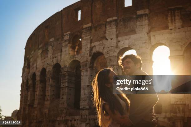 couple of tourists in rome in romantic mood - romano imagens e fotografias de stock