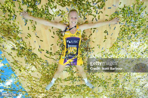 Laura Langman of the Lightning celebrates victory amongst the confetti after winning the Super Netball Grand Final match between the Lightning and...