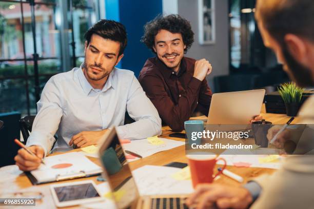 people in a shared office - peeking stock pictures, royalty-free photos & images