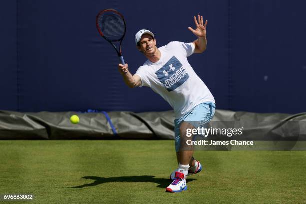 Andy Murray of Great Britain plays a forehand shot during a practice session ahead of the Aegon Championships at Queens Club on June 16, 2017 in...