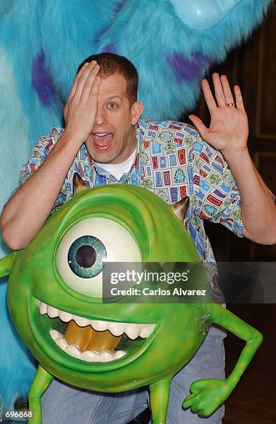 American director Pete Docter attends a promotional event for his new movie, "Monsters, Inc" February 1, 2002 in Madrid, Spain. Docter stands behind...