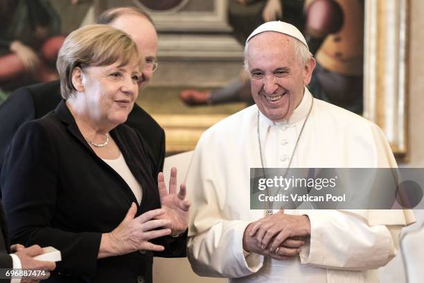 Pope Francis meets German Chancellor Angela Merkel at his private library in the Apostolic Palace on June 17, 2017 in Vatican City, Vatican. During...