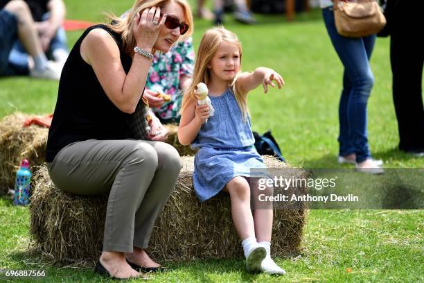 Young girl enjoys an ice creams as people attend a Great Get Together event in memory of murdered MP Jo Cox on June 17, 2017 in Heckmondwike,...