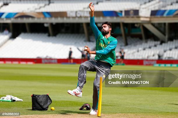 Pakistan's Mohammad Amir bowls during a nets practice session at The Oval in London on June 17 on the eve of the ICC Champions Trophy Final cricket...