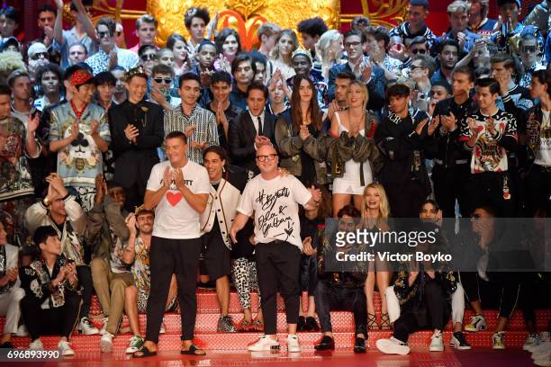 Designers Stefano Gabbana and Domenico Dolce acknowledge the applause of the audience at the Dolce & Gabbana show during Milan Men's Fashion Week...