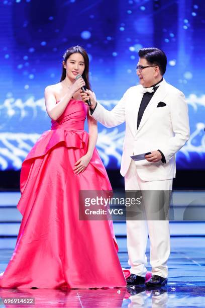 Actress Liu Yifei and host Cao Kefan attend Gala Night of 2017 Shanghai International Film and TV Festival on June 17, 2017 in Shanghai, China.