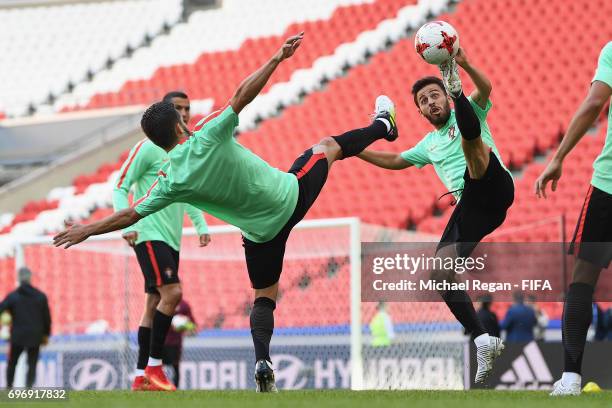 Joao Moutinho and Bernardo Silva in action during the Portugal Training and Press Conference on June 17, 2017 in Kazan, Russia.