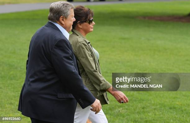 Viktor and Amalija Knavs, the parents of US First Lady Melania Trump, make their way to board Marine One on the South Lawn of the White House on June...