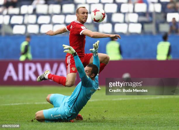 Dennis Glushakov of Russia scores his sides first goal past Stefan Marinovic of New Zealand during the FIFA Confederations Cup Russia 2017 Group A...