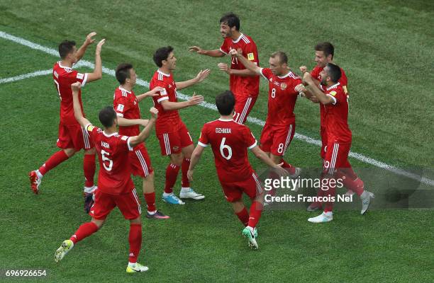 Dennis Glushakov of Russia celebrates scoring his sides first goal with his Russia team mates during the FIFA Confederations Cup Russia 2017 Group A...