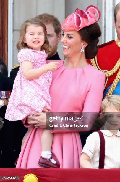 Catherine, Duchess of Cambridge, Princess Charlotte of Cambridge, Prince George of Cambridge and Prince William, Duke of Cambridge look out from the...