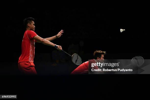 Tontowi Ahmad and Liliyana Natsir of Indonesia compete against Chan Peng Soon and Yen Wei Peck of Malaysia during Mixed Double Semifinal match of the...