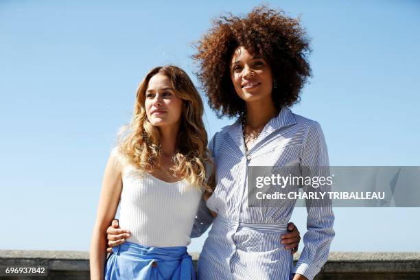 French actress Alice David and French actress and singer Stefi Celma pose during a photo-call for the Cabourg Romantic Film Festival in Cabourg,...