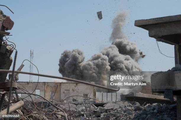 An Iraqi forces airstrike targets an Islamic State sniper position June 17, 2017 in al-Shifa, the last district of west Mosul under Islamic State...