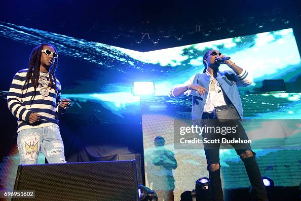 Trio Rappers Rappers Takeoff and Quavo of the hip hop trio Migos perform onstage ...
