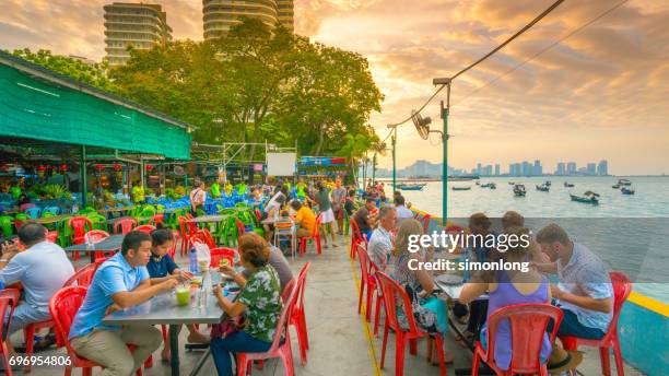 outdoor foodcourt - penang state stock pictures, royalty-free photos & images