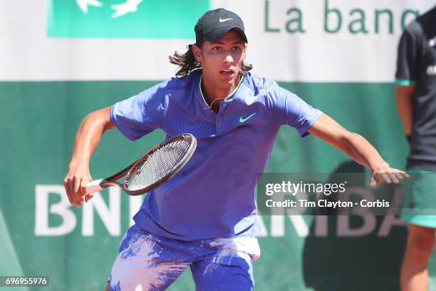 French Open Tennis Tournament - Day Fourteen. Alexei Popyrin of Australian defeating Nicola Kuhn of Spain to win the Boy's Singles Final match on...