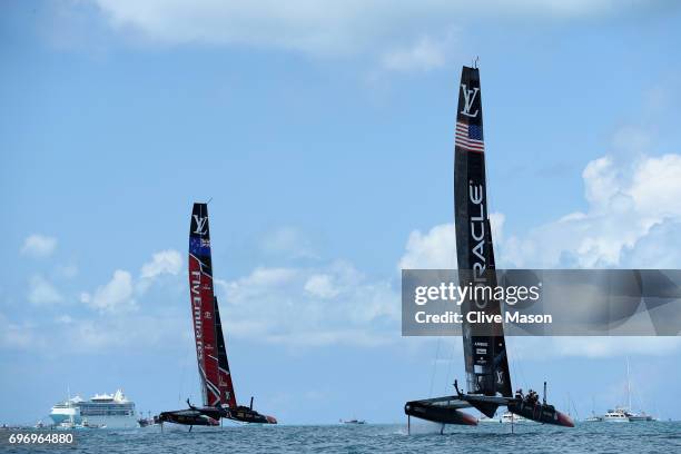 Oracle Team USA with helmsman Jimmy Spithill competes with Emirates Team New Zealand with helmsman Peter Burling during day 1 of the America's Cup...