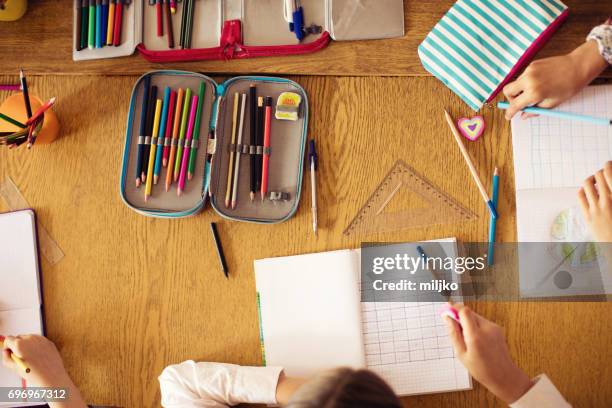 pupils on class in school - kid hand raised stock pictures, royalty-free photos & images