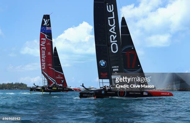 Oracle Team USA with helmsman Jimmy Spithill competes with Emirates Team New Zealand with helmsman Peter Burling during day 1 of the America's Cup...