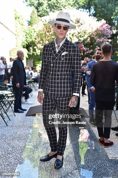 James Edward Quaintance attends the Versace show during Milan Men's Fashion Week Spring/Summer 2018 on June 17, 2017 in Milan, Italy.