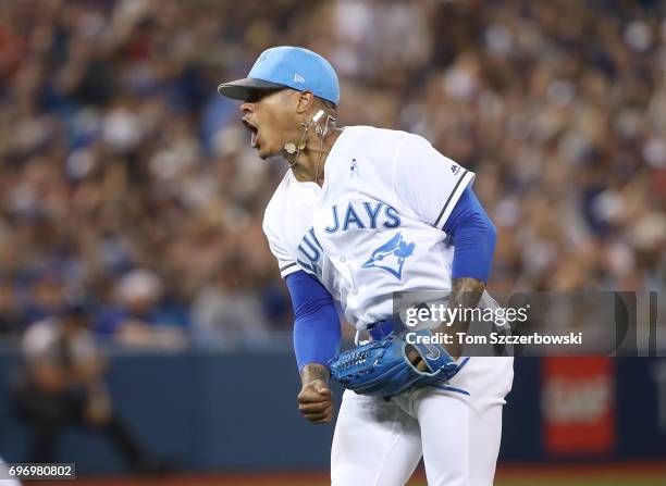 Marcus Stroman of the Toronto Blue Jays celebrates after getting a double play to end the fifth inning during MLB game action against the Chicago...