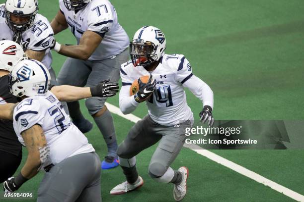 Baltimore Brigade WR Brandon Tompkins runs after making a catch to score on a 40-yard pass play during the fourth quarter of the Arena League...