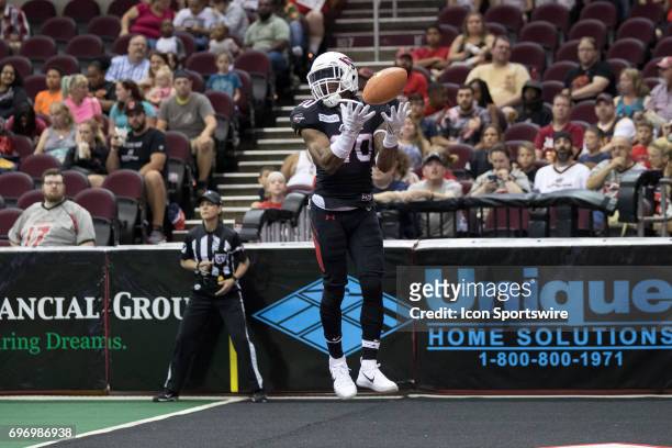 Cleveland Gladiators DB Kenny Veal leaps as he fields a kickoff off the end zone netting during the second quarter of the Arena League Football game...