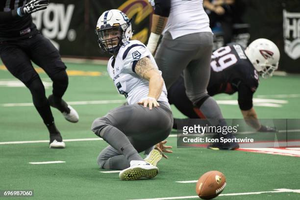 Baltimore Brigade QB Shane Carden fumbles the football during the first quarter of the Arena League Football game between the Baltimore Brigade and...