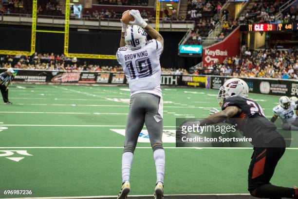 Baltimore Brigade WR Paul Browning makes a 4-yard touchdown catch as Cleveland Gladiators DB Jordan Holland defends during the second quarter of the...