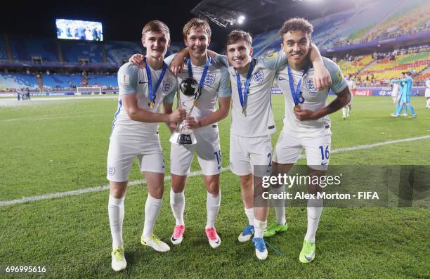 Callum Connolly, Kieran Dowell, Jonjoe Kenny and Dominic Calvert-Lewin of England celebrate with the trophy after the FIFA U-20 World Cup Korea...