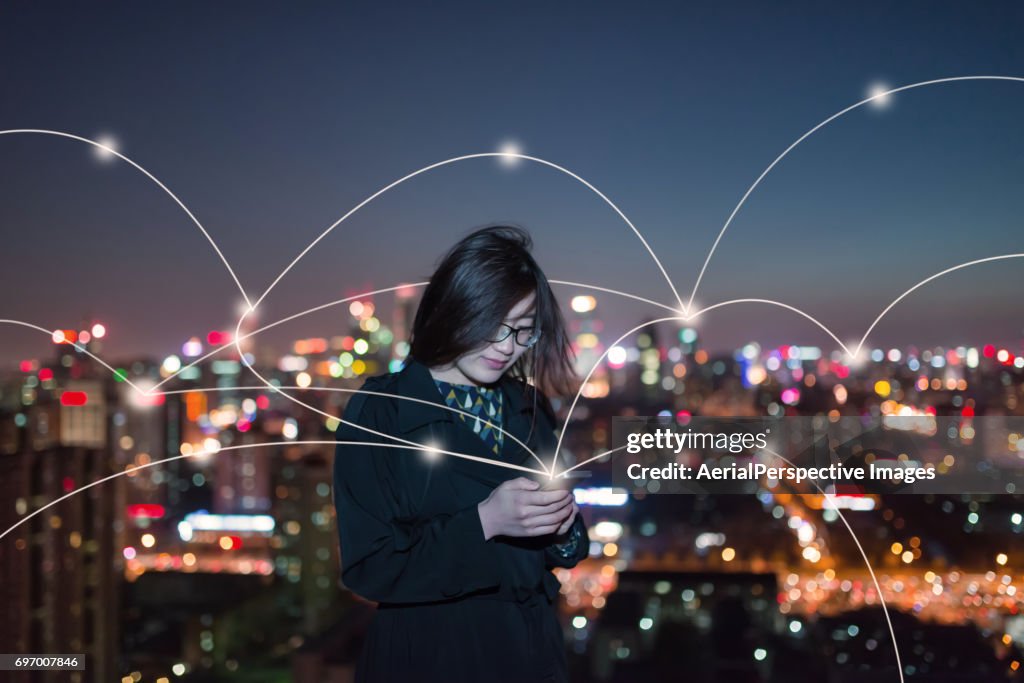 Young Asian Girl Using Smartphone and Smart Life