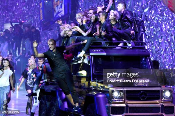 Philipp Plein and models aknowledge the applause of the audience at the Philipp Plein show during Milan Men's Fashion Week Spring/Summer 2018 on June...